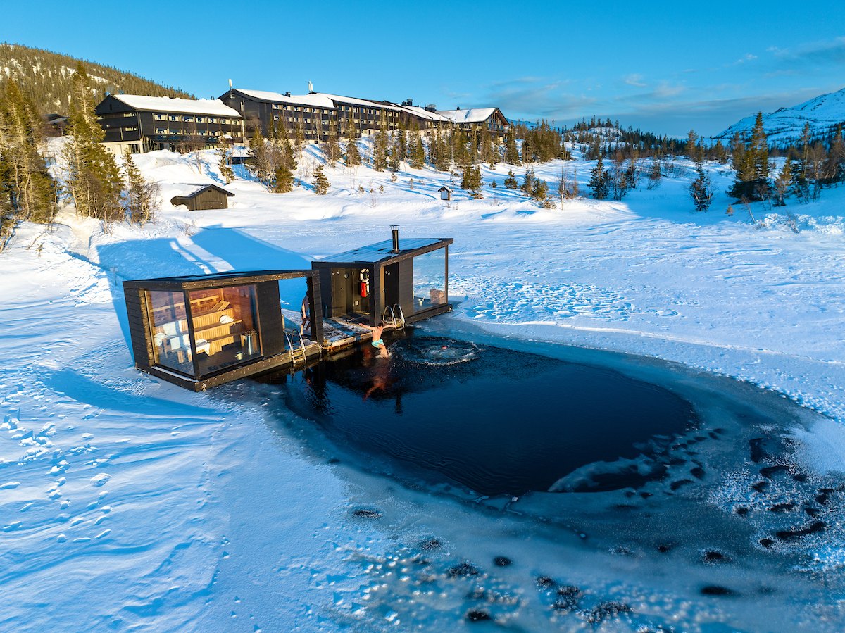 Sauna floating on a frozen lake in Gausta