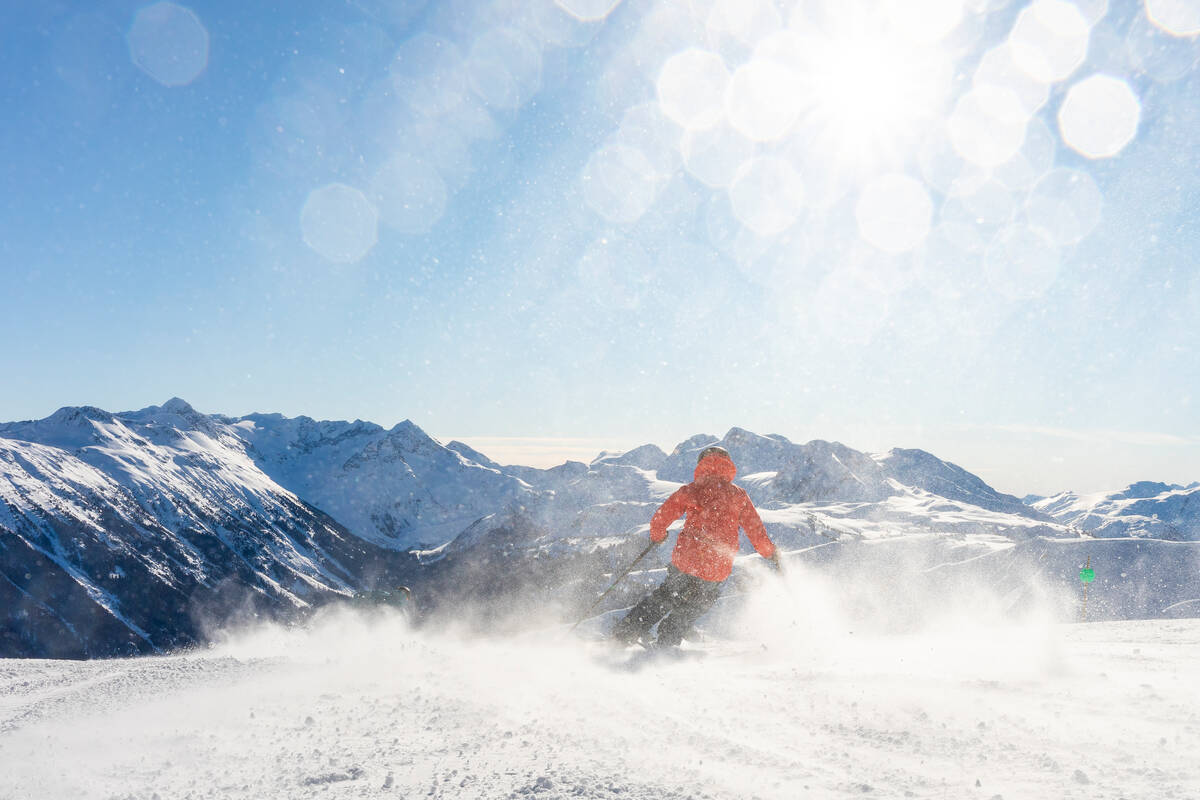 A Skier Whizzing Down one of Whistler's 200 Runs © Tourism Whistler / Ben Girardi