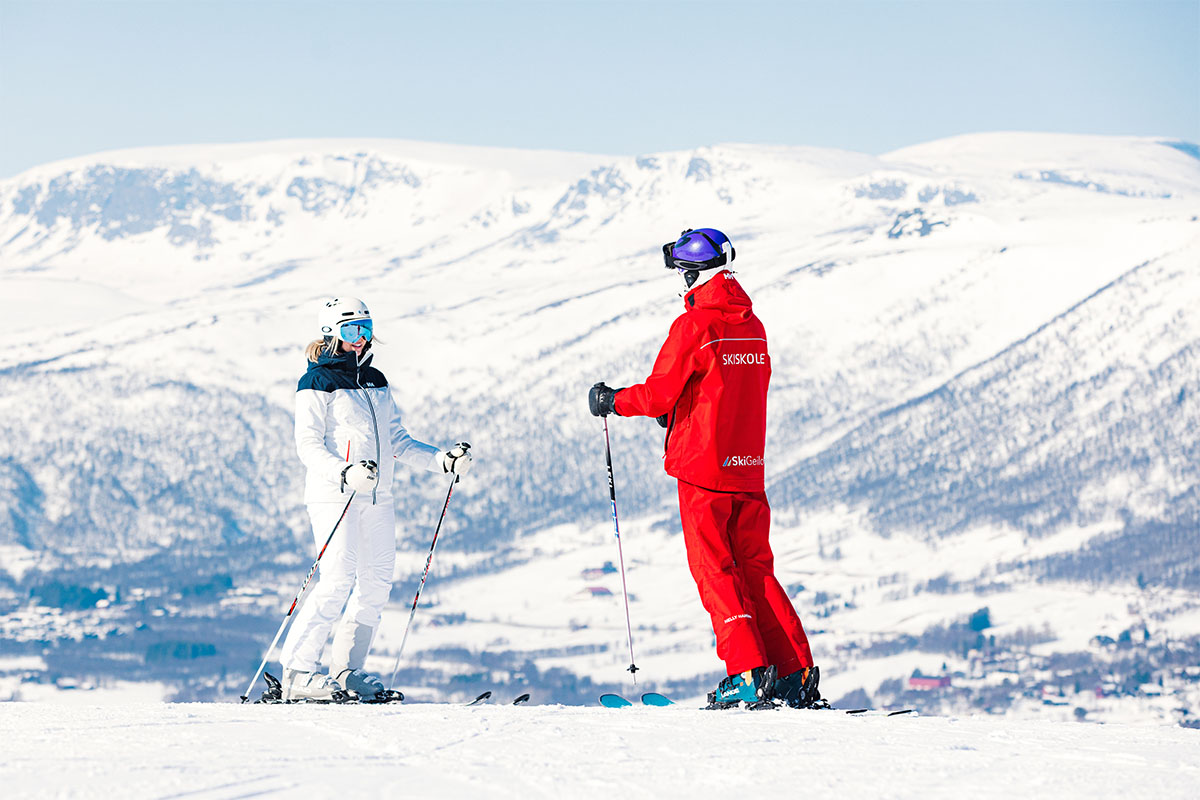Geilo ski school instructor with student on the slopes