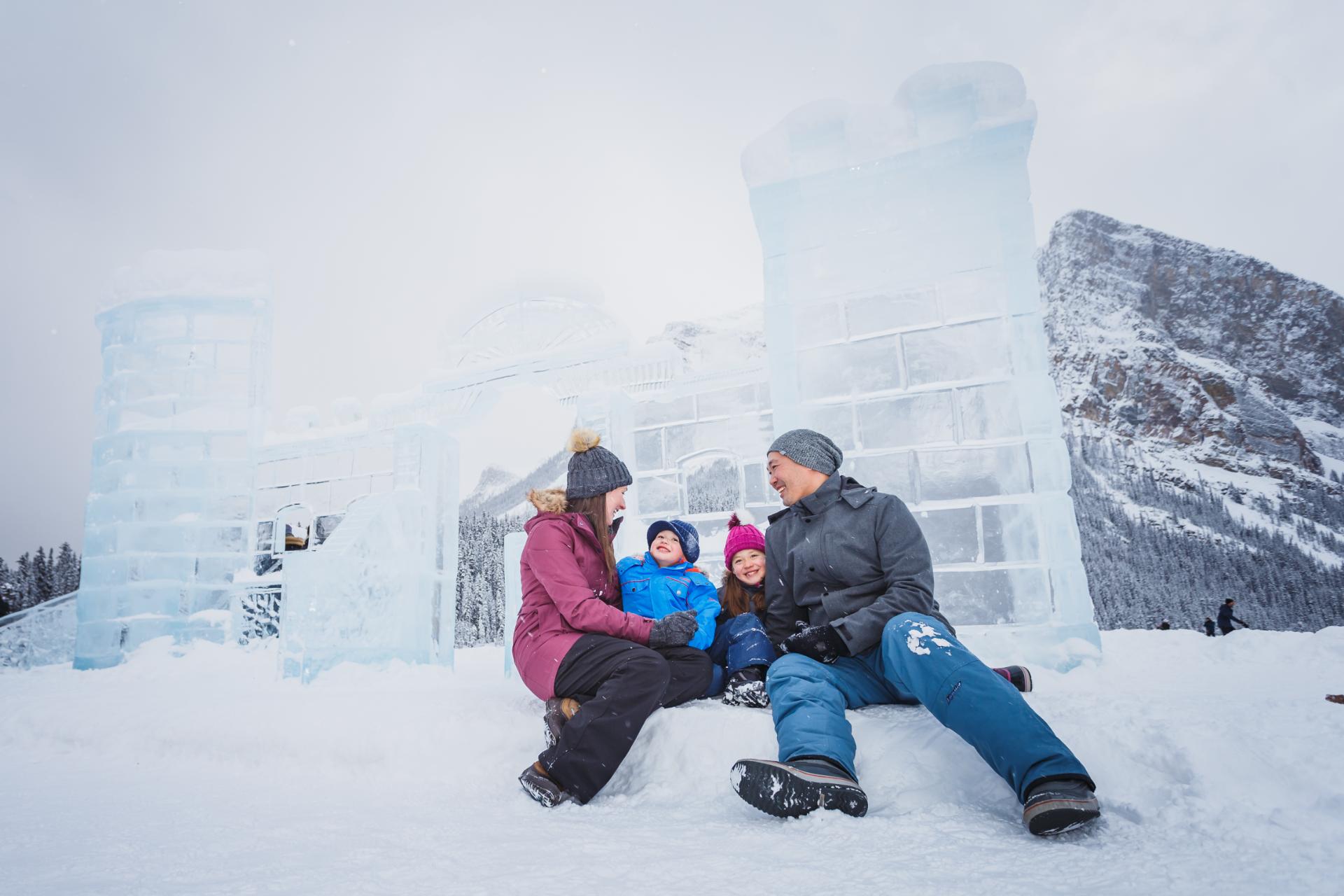 Family enjoying the snow, sculptures, and winter sports at SnowDays Family enjoying the snow, sculptures, and winter sports at SnowDays